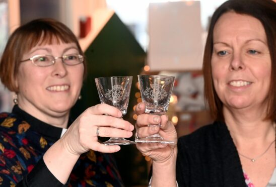 Reverend Canon Vittoria Hancock and Brakeley Gift Room owner Wendy Cobban with the sherry glasses. Image: Darrell Benns/DC Thomson