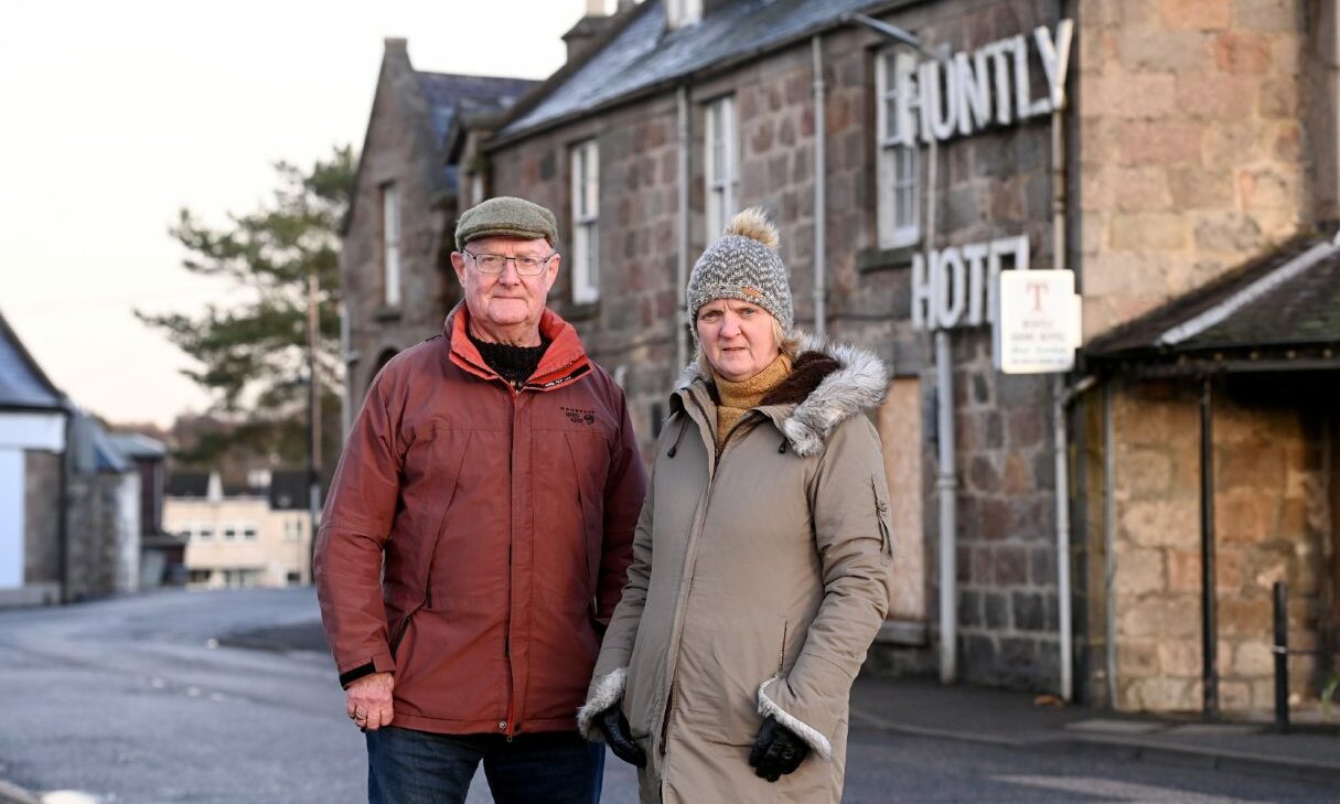 David Marshall and Claire Fraser outside the Huntly Arms Hotel back plans to save the building