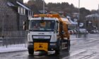 One of the Aberdeen gritters spreading on Great Northern Road.