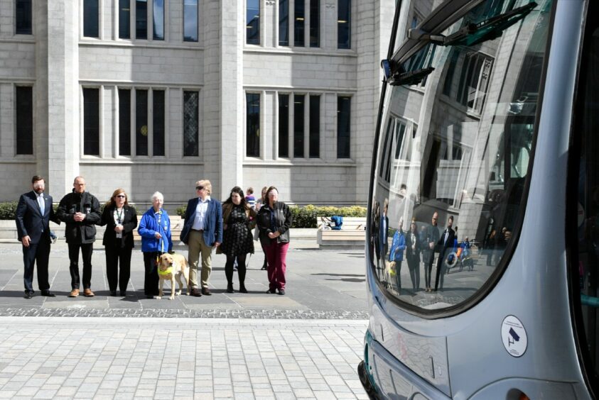 Campaigners from RNIB Scotland and Guide Dogs Scotland asked councillors to experience the shared bus and pedestrian area in Broad Street with a temporary visual impairment. Image: Kami Thomson/DC Thomson.