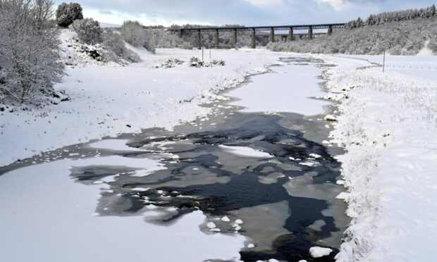 An almost competely frozen River Findhorn at Tomatin.
Image: Sandy McCook/DC Thomson