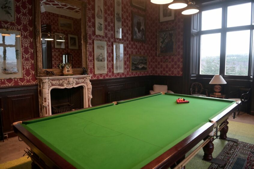 A snooker table in Carbisdale Castle
