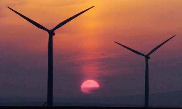 No one wants to see the sun go down on Scotland's wind energy ambitions. Image: David Cheskin / PA.