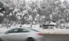 There was heavy snow on the A9 this morning. Image: Sandy McCook/DC Thomson