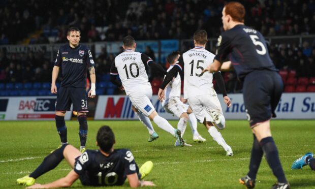 It's celebration time for Inverness number 10, Aaron Doran, after he shot his side in front in the Highland derby at Ross County on January 1, 2015. Image: SNS Group