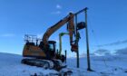 SSEN worker trying to restore power in Bixter, Shetland