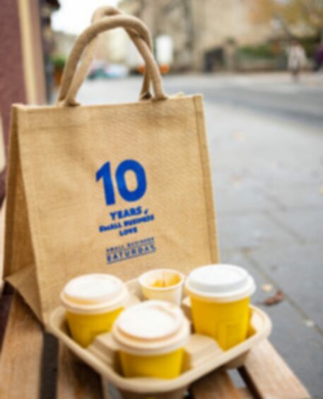 Small Business Saturday bag with three coffee cartons