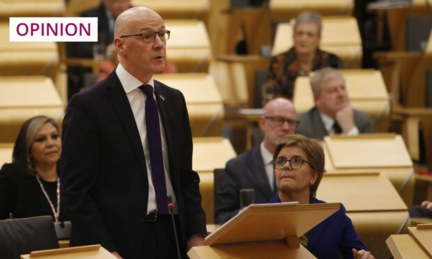 Acting Finance Secretary delivers the Scottish budget at Holyrood (Image: Andrew Cowan/Scottish Parliament/PA)
