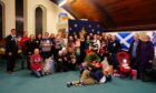 Ukrainians families with host families and members from Elgin Baptist Church. Image: Eleanor Clarke