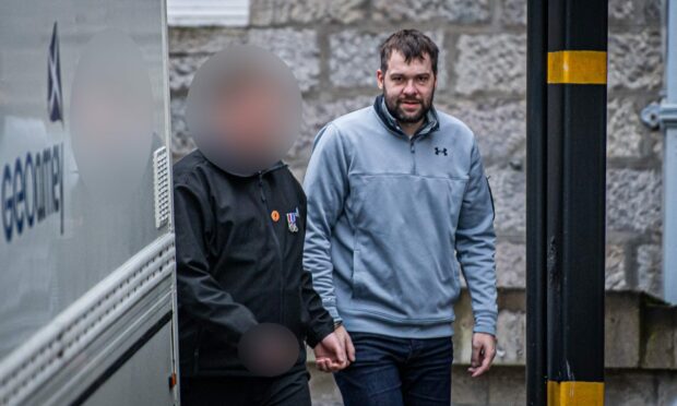 Richard Cameron is taken back to prison from Aberdeen Sheriff Court. Image: Wullie Marr/DC Thomson