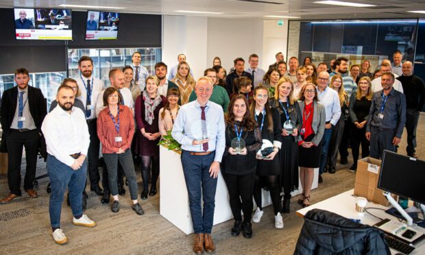 Editorial staff at The Press and Journal celebrate awards wins in the newsroom