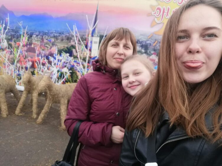 Lena with Mum Tetyana and sister Nastya pictured.