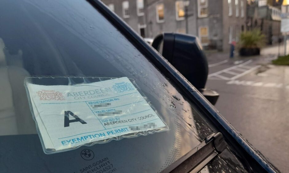 Aberdeen City Council parking permit in car window