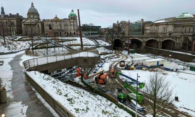 Work continues in Union Terrace Gardens, despite the snow. Council chiefs are still confident of opening before Christmas. Image: Alastair Gossip/DC Thomson, December 8.