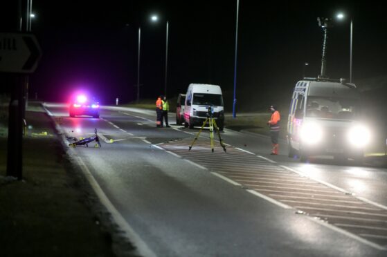 Police crash investigators at the scene of the tragedy on the A90 near Peterhead. Image: DC Thomson