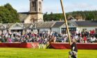 Tossing the caber at the annual Aberlour Strathspey Highland Games. Image: Sandy Stott