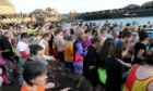 Taking the plunge: Brave souls will take to the icy water at Stonehaven Harbour to celebrate the New Year. Photo by Colin Rennie, DC Thomson.