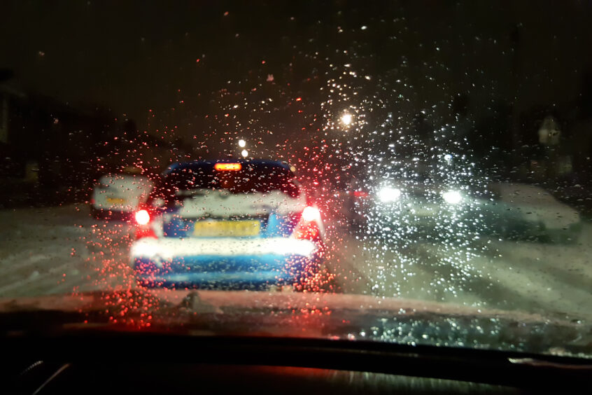 Car windscreen during rain - image of driving in winter weather
