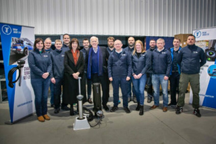 Members of the Trojan Energy team with Maggie McGinlay and Sir Ian Wood