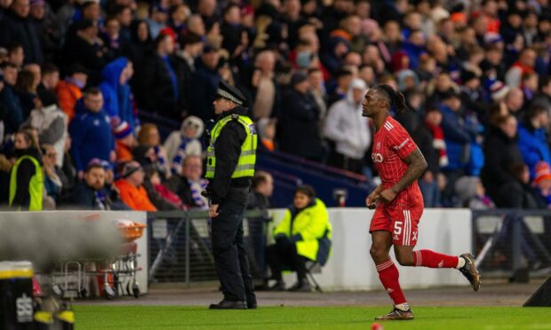 Anthony Stewart of Aberdeen heads up the tunnel after his red card against Rangers in the League Cup semi-final. Image: Shutterstock
