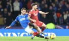 Aberdeen's Matty Kennedy is fouled  by Borna Barisic of Rangers in the League Cup semi-final. Image: Shutterstock