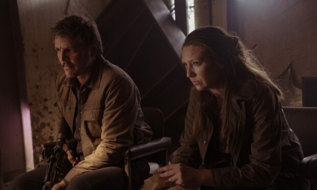 Pedro Pascal as Joel  and Anna Torv as Tess in The Last of Us