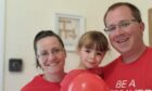 Chris Bain with his wife Katee and daughter Kayleigh showing support for DKMS. Image: Chris Bain.