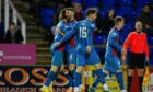 The Inverness players celebrate as an own goal makes it 5-1 against Cove Rangers. Image: SNS.