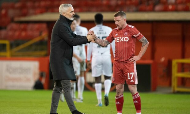 Aberdeen manager Jim Goodwin and Jonny Hayes look dejected at full-time after the 0-0 Premiership draw with Ross County. Image: SNS