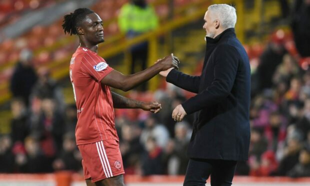 Aberdeen manager Jim Goodwin with captain Anthony Stewart at full time after the 2-0 defeat of St Johnstone. (Photo by Craig Foy / SNS Group)