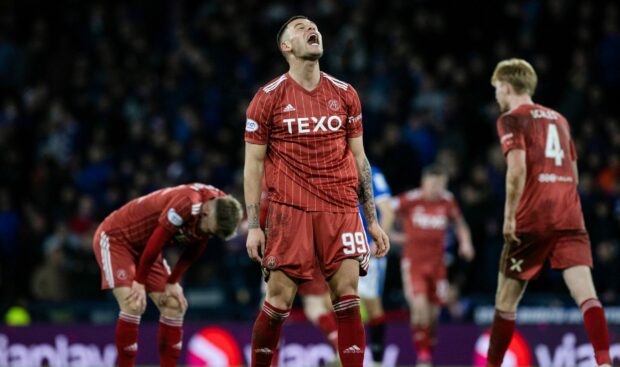 Aberdeen's Christian Ramirez shows his frustration after missing a late chance against Rangers. Image: SNS