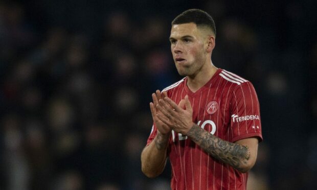 Aberdeen's Christian Ramirez applauds the fans at full-time after his last appearance, in the League Cup semi-final loss to Rangers at Hampden. Image: SNS