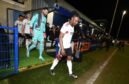 Captain Anthony Stewart leads out Aberdeen ahead of the Scottish Cup fourth-round tie at Darvel. Image: SNS