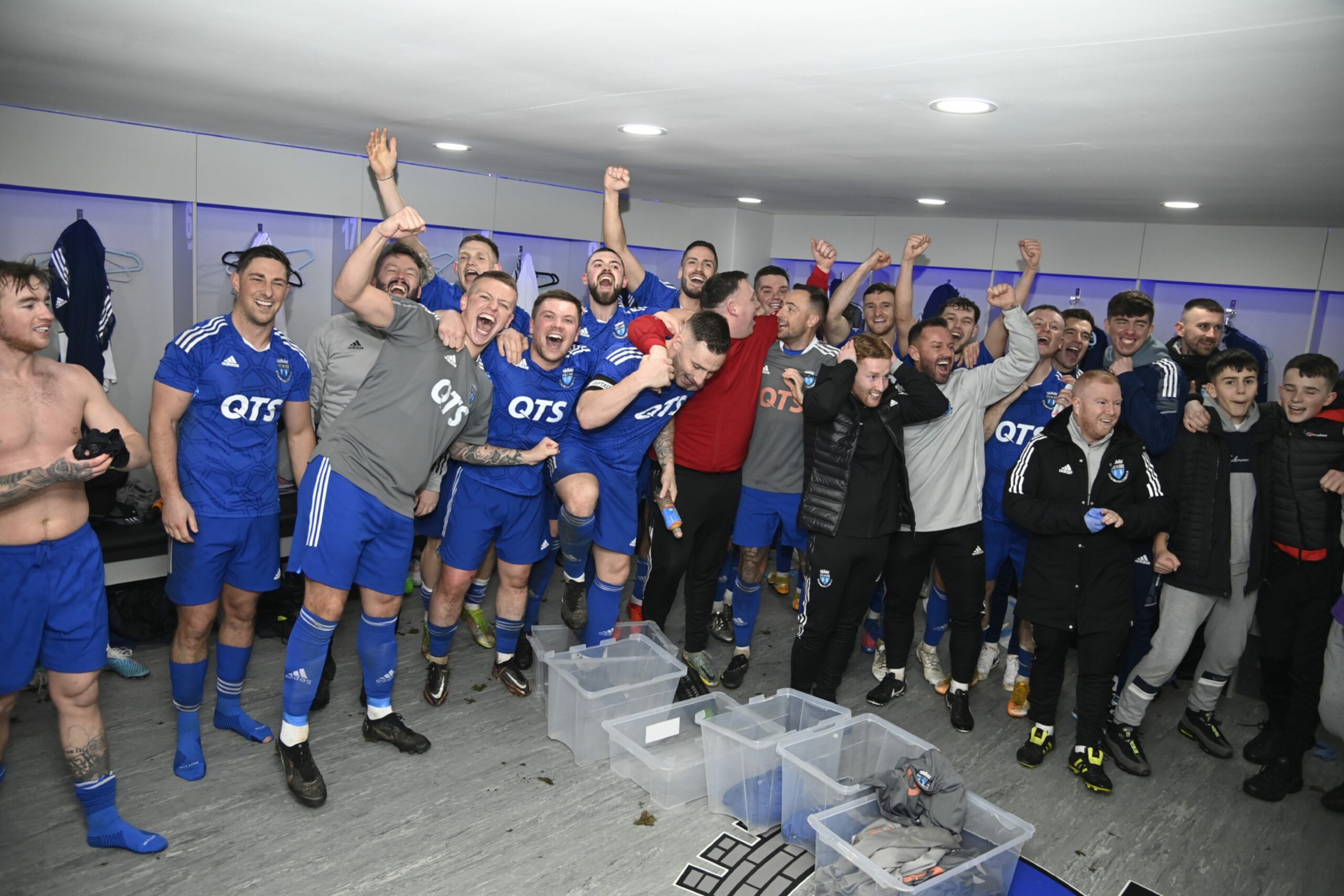 Darvel players celebrate in the changing room after a famous win against Aberdeen at Recreation Park.