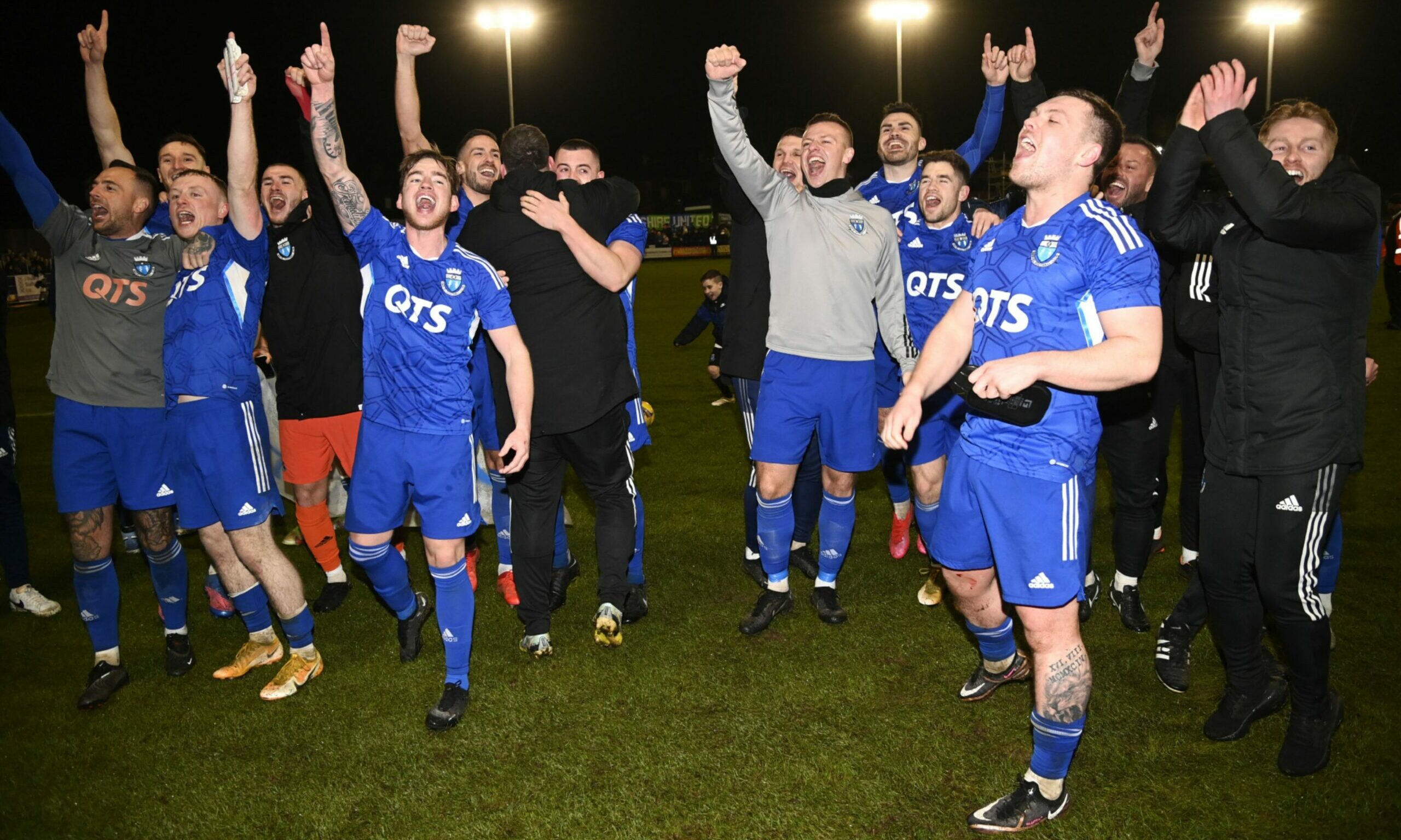 Darvel Football club celebrating after winning a game against Aberdeen