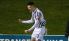 Dylan Lawrence, celebrating scoring for Elgin City, is going on loan to Lossiemouth. Image: SNS Group