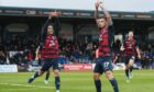 Eamonn Brophy celebrates his debut goal for Ross County against Kilmarnock with Yan Dhanda. Image: SNS