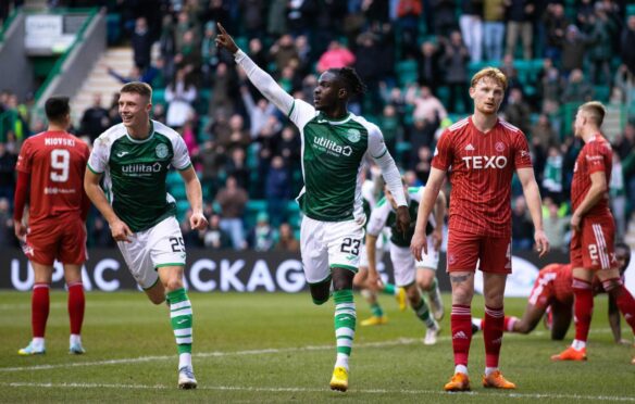Elie Youan celebrates his goal to make it 3-0 Hibs against Aberdeen. Image: SNS