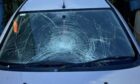 Smashed car window in Anderson Drive. Image: Dyno Stuart/ Facebook