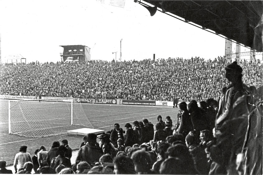 1980 - A packed Pittodrie watch on as the Dons march towards a Premier Division title win. 