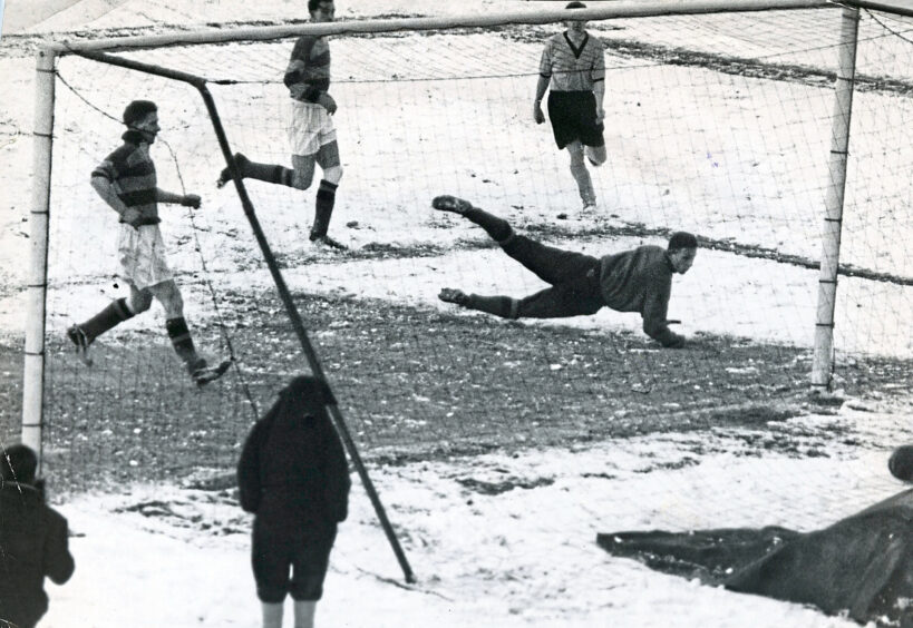 1959 - The Dons score a third against Partick Thistle at a snow-covered Pittodrie.