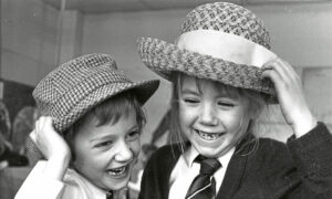 1989 - Banchory Primary School P2 pupils Alison Culshaw, left, and Danielle Harkes have a bit of a giggle as they try on hats.