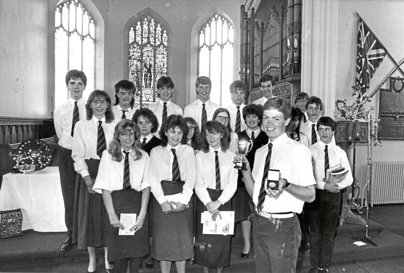 1986 - Proud fifth-year pupil Christopher Mair, 16, shows his dux medal and Emslie Cup for golf after Banchory Academy’s prizegiving in St Ternan’s East Church.