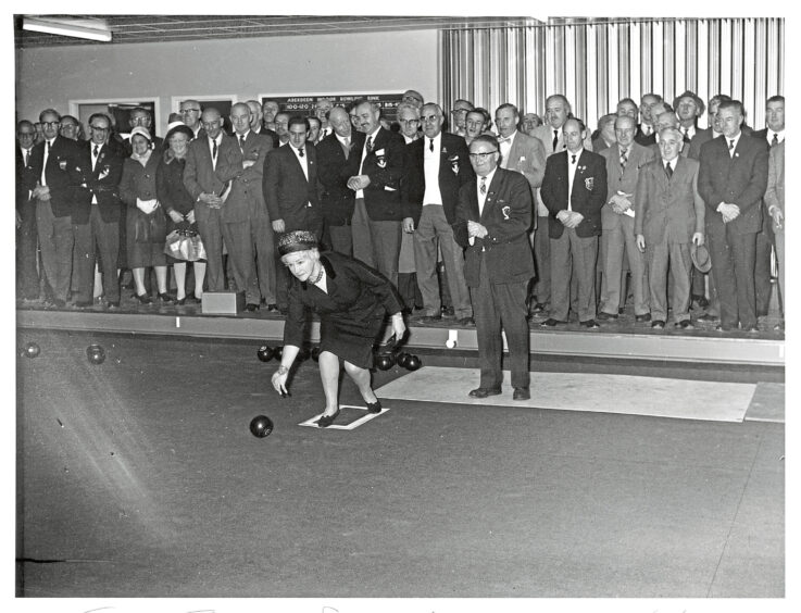 1963 - Lady Provost Jessie Graham delivers the first bowl at the opening ceremony.
