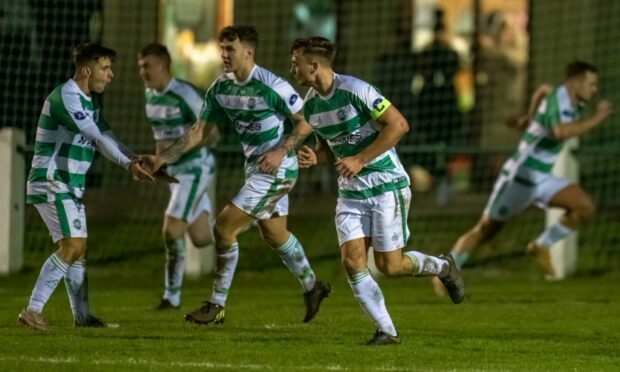 Buckie Thistle players celebrate their second goal against Aberdeen which was scored by Kyle MacLeod.