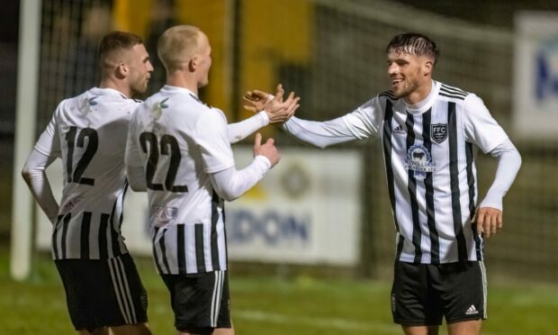 25 January 2023. Christie Park, Park Street, Huntly, Aberdeenshire, Scotland, AB54 8JE. This is from the Breedon Highland League Football Match between Huntly FC and Fraserburgh FC. PCTURE CONTENT:- Ryan sargent celebrates no 2