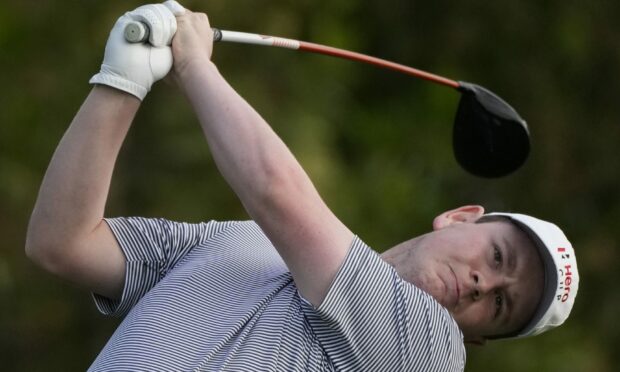 Robert MacIntyre in action on day two of the  Hero Cup at Abu Dhabi Golf Club. Image: AP.