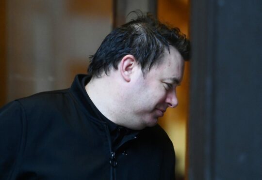 James Anderson demanded our photographer to delete his picture as he left court. Image: DC Thomson.