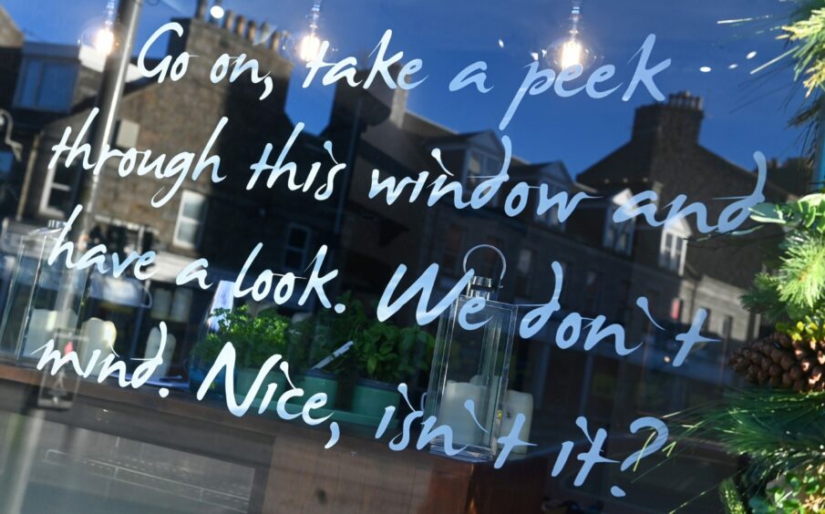 text on the glass window of Bev's Bistro, a great place for afternoon tea in Aberdeen