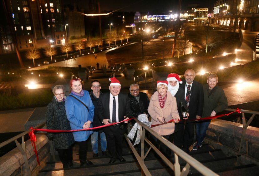 Labour's last council leader, Jenny Laing cuts the ribbon alongside current group leader Barney Crockett to mark the opening of Union Terrace Gardens on December 22 2022. Image: Chris Sumner/DC Thomson.